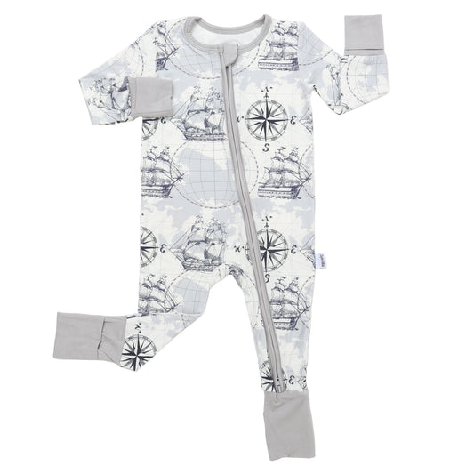 Baby onesie with ship pattern and gray accents on a white background