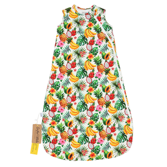 Dress with tropical fruit pattern on a white background
