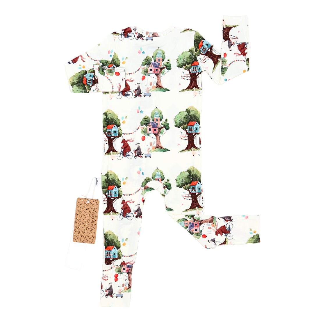 Children's leggings with treehouse pattern on a white background