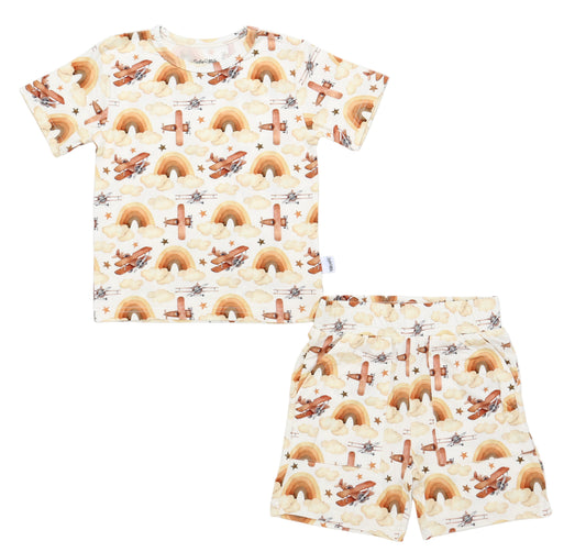 T-shirt and shorts set with rainbow and cloud pattern on a white background