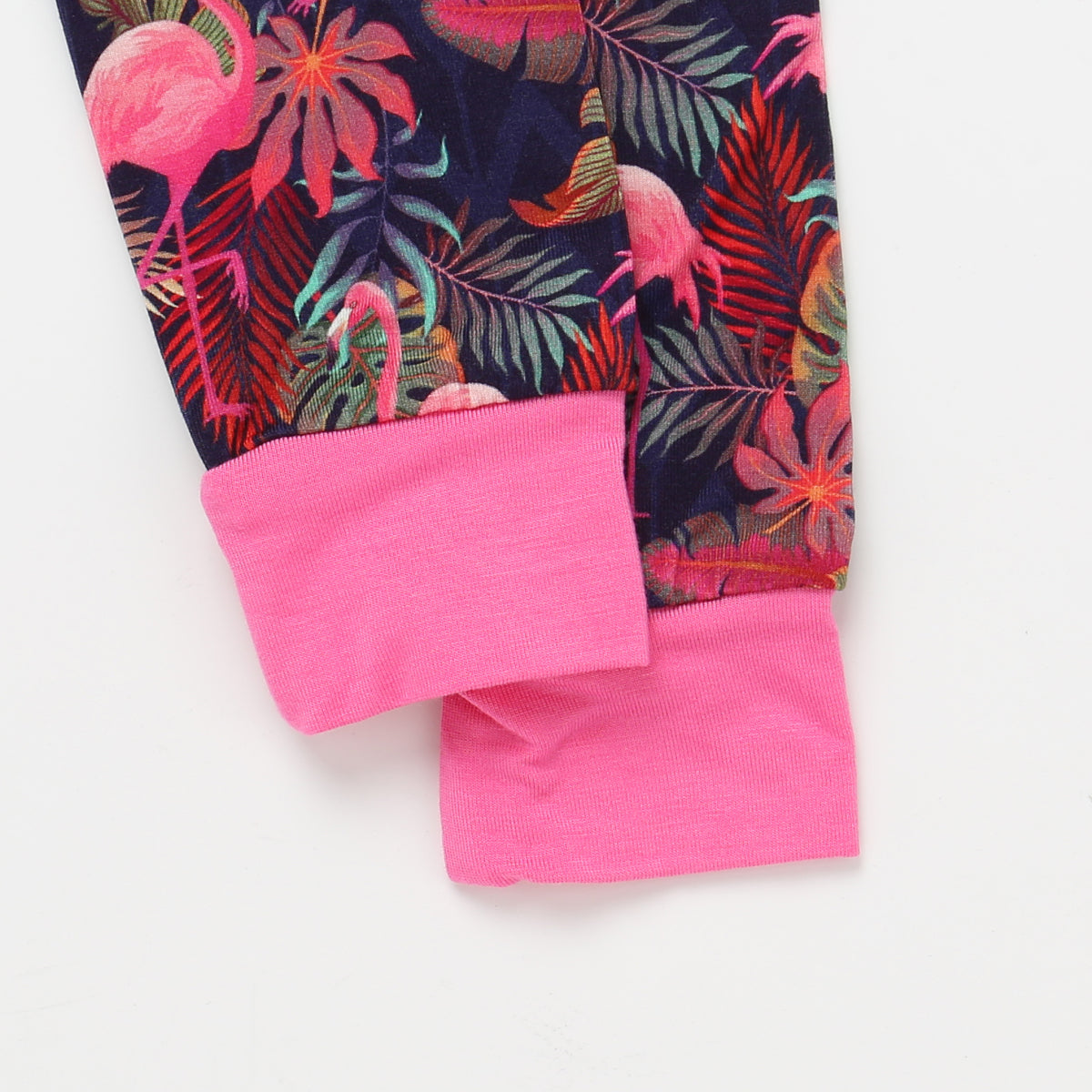 Leggings with flamingo and leaf pattern on a white background